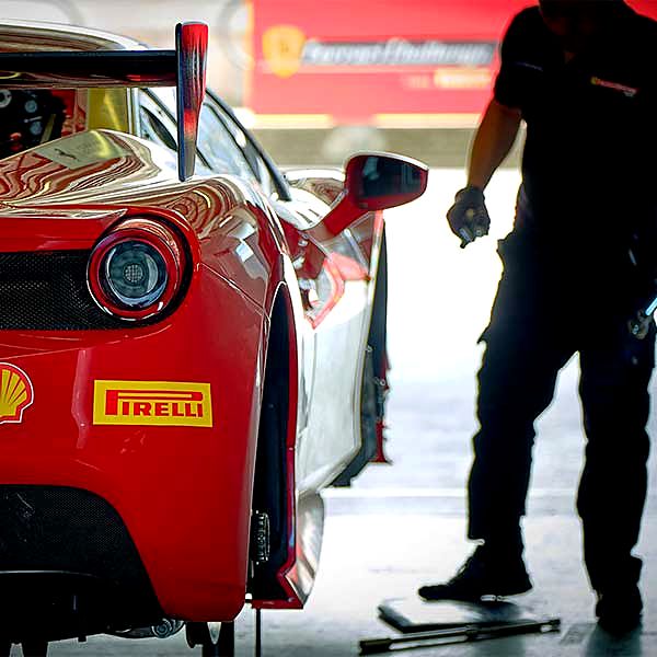 Mechanic working on a car in the workshop